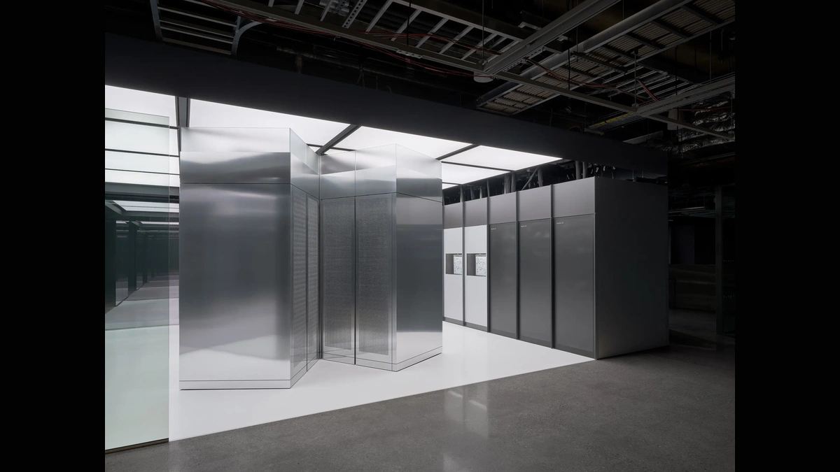 IBM Quantum System Two enclosure alongside additional quantum hardware racks in an IBM lab