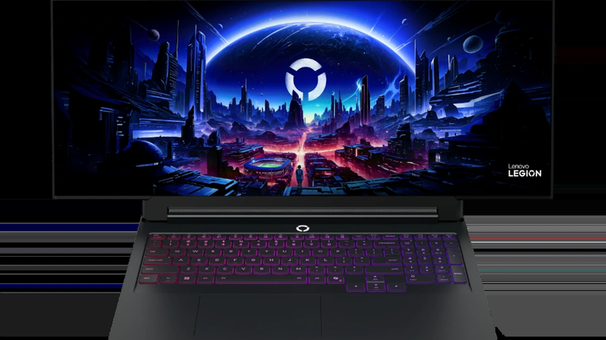 Lenovo Legion gaming laptop open with a purple-backlit keyboard and a futuristic city wallpaper on screen