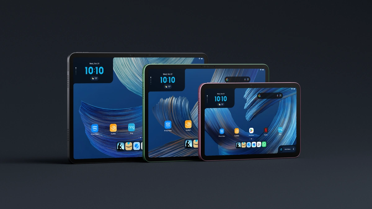 Amazon Alexa Tablet 12 Pro, 11 and 8 standing side by side on a dark surface with their home screens lit