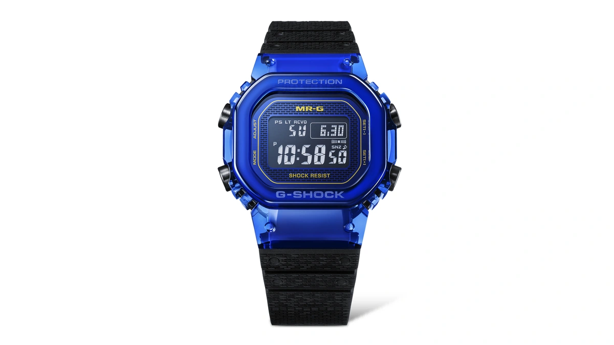 Casio MR-G G-Shock watch with a blue translucent bezel and black strap, shown front on