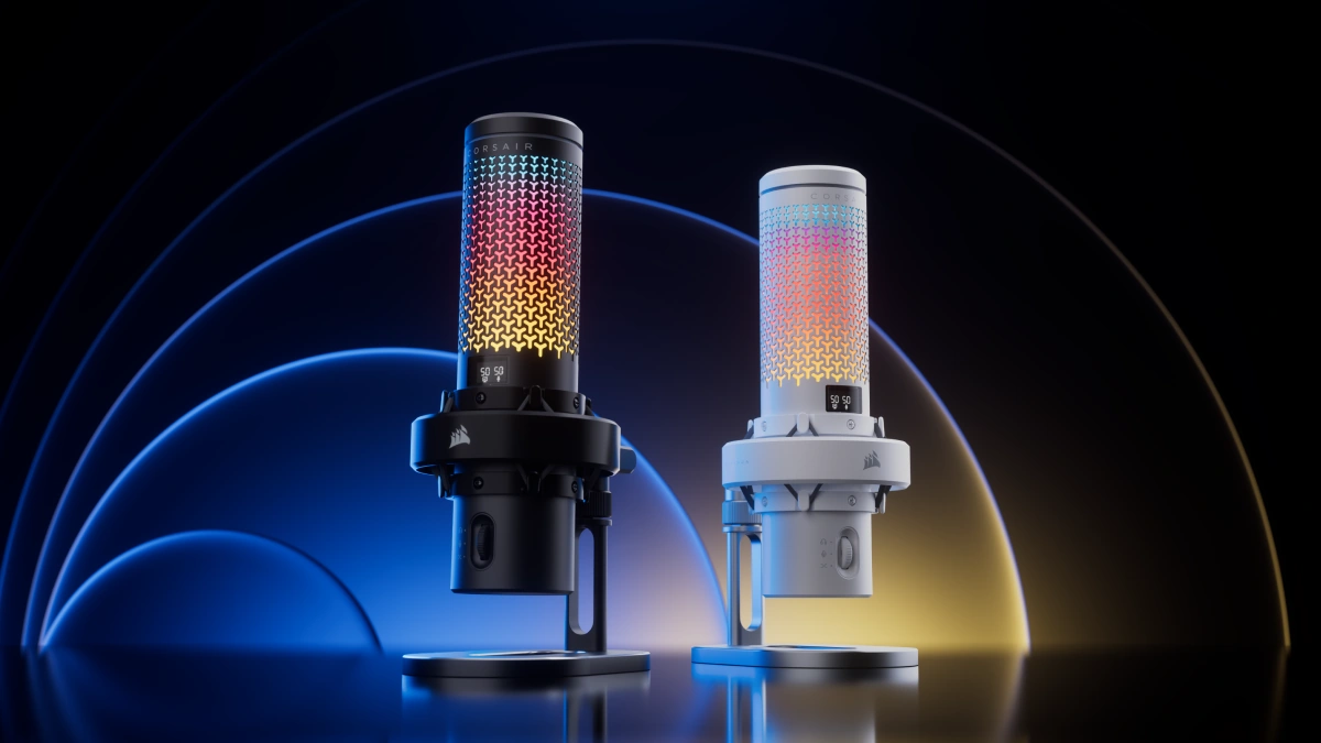 Black and white CORSAIR VOXARA microphones on stands with RGB-lit grilles, in front of glowing blue and amber arcs
