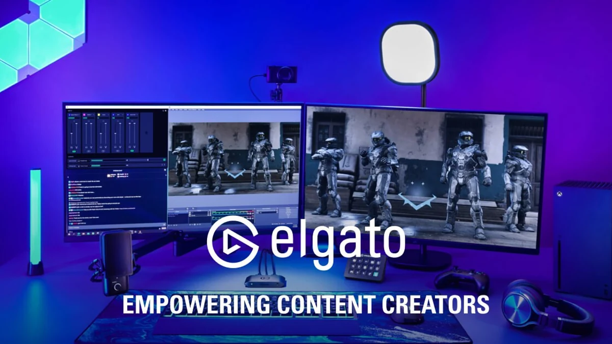 Elgato streaming setup with capture device, key light, microphone, Stream Deck, and dual monitors