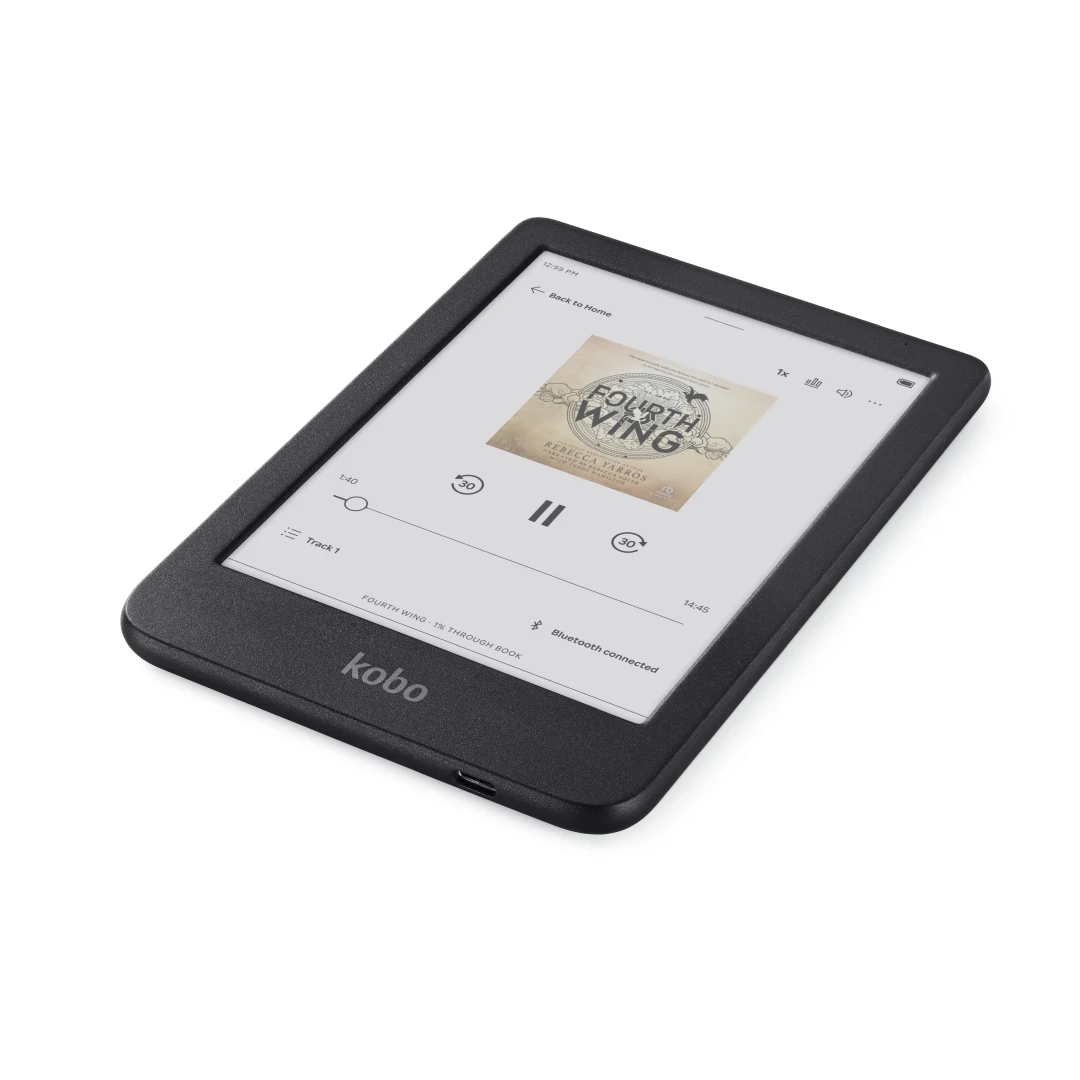 Kobo Clara e-reader shows an audiobook cover on its screen while lying at an angle