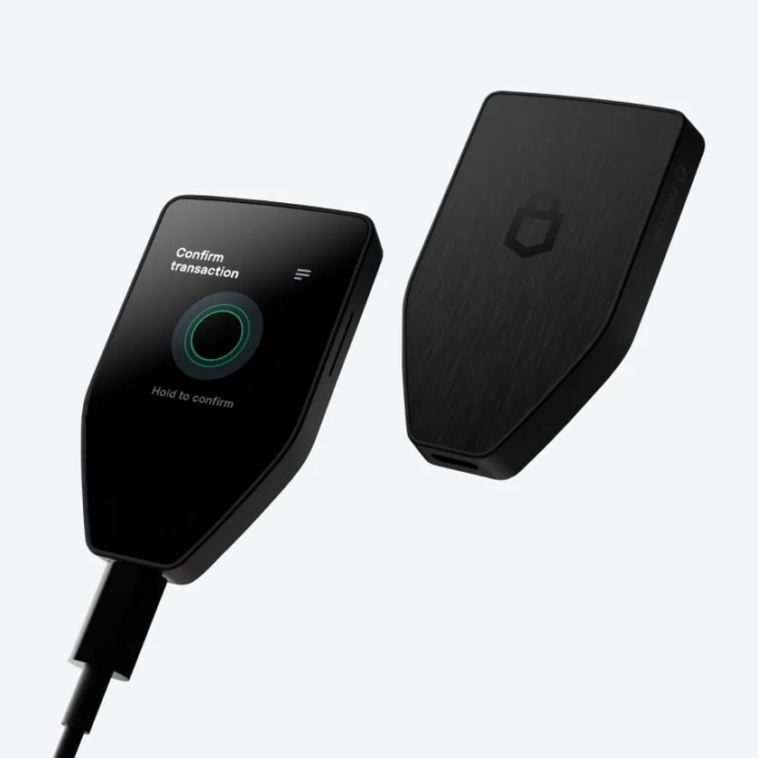 Trezor Safe 5 hardware wallet shows self-custody, the crypto custody model, with a transaction confirm screen