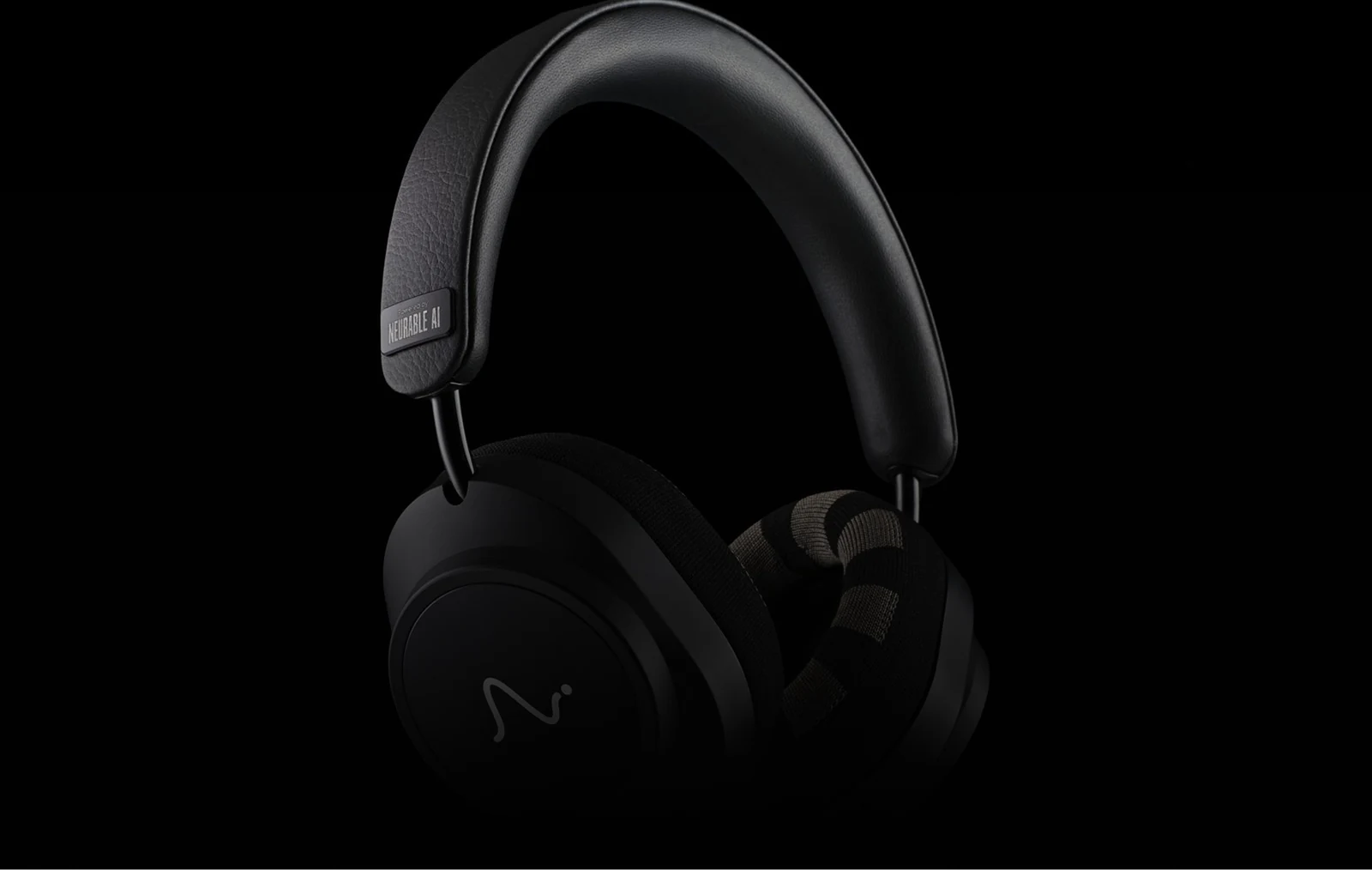Neurable EEG headphones show a brain-computer interface worn like headphones, against a black background
