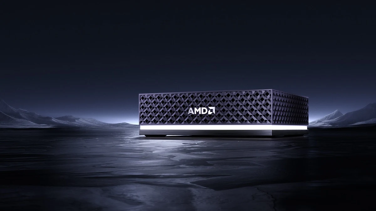 AMD Ryzen AI Halo mini PC shows a patterned grille and a glowing base on a dark icy landscape
