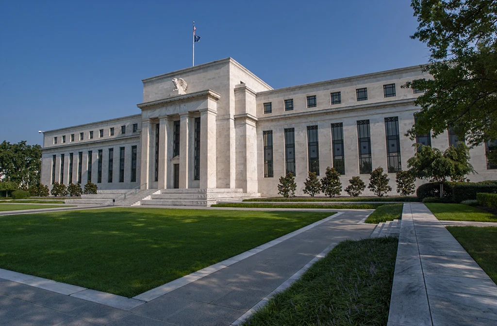 The Federal Reserve's Eccles Building, a regulator in the stablecoin debate, shows a white marble facade