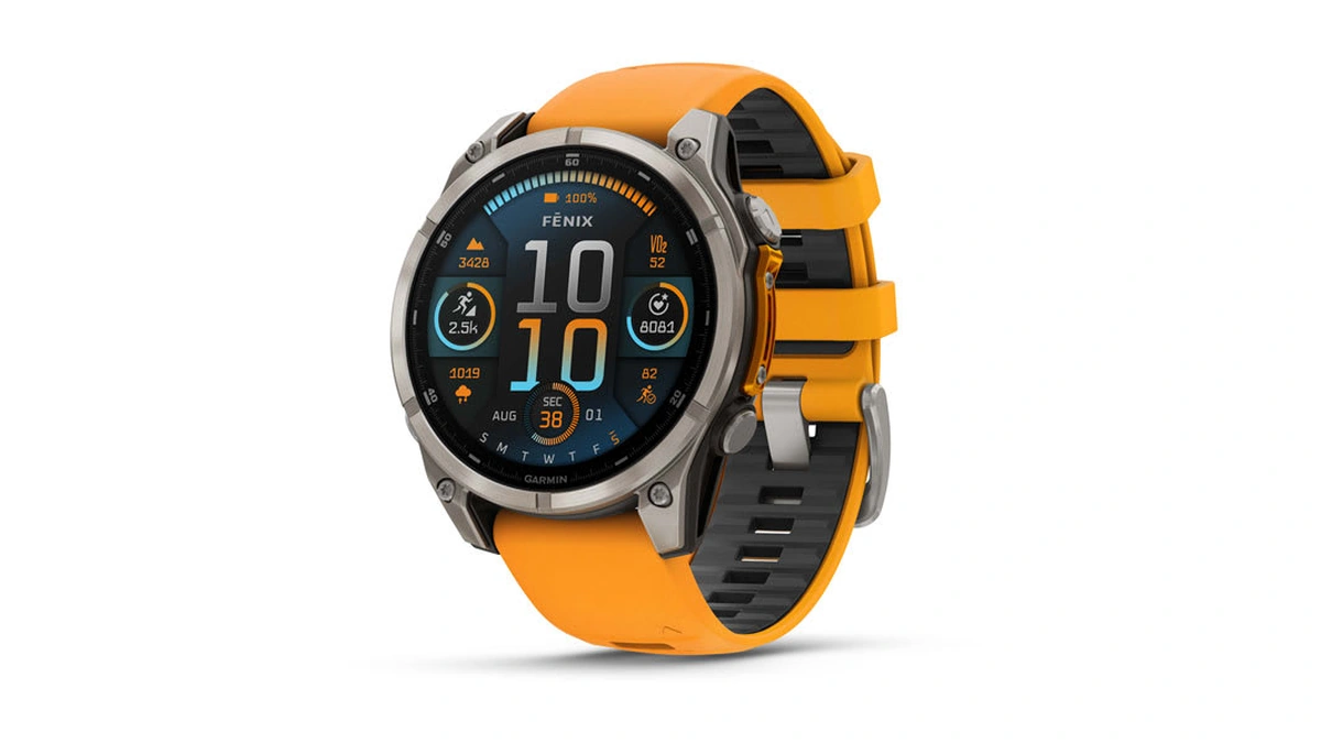 A Garmin Fenix smartwatch with an orange band and a digital display showing time, date, and fitness metrics.