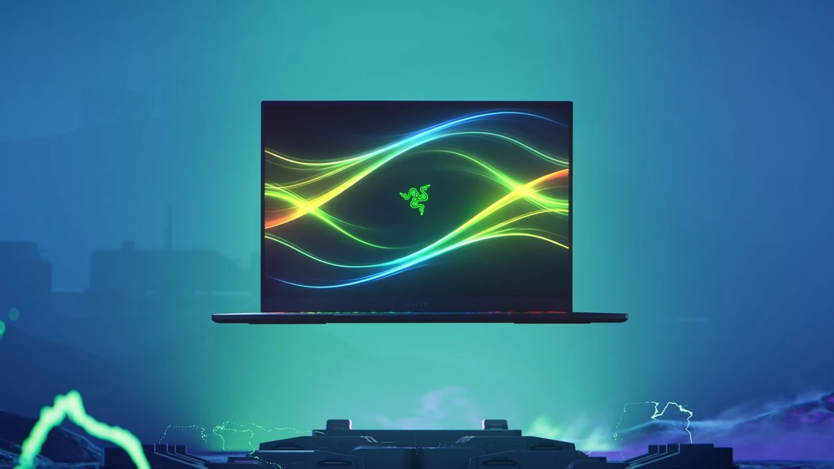 A Razer Blade 16 gaming laptop shown against a teal backdrop.