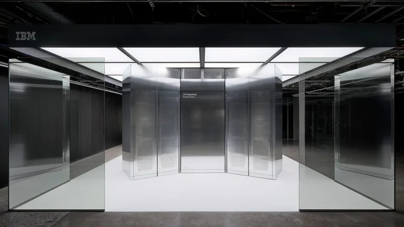 IBM Quantum System Two housed in mirrored enclosures under an illuminated ceiling