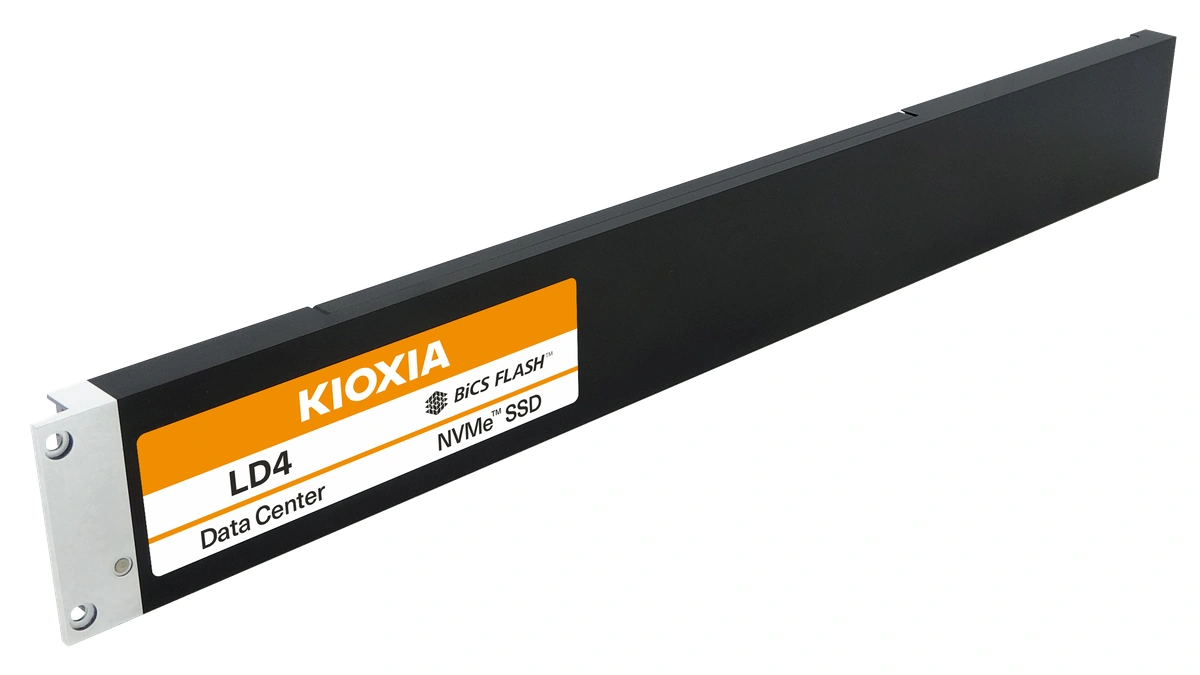 KIOXIA LD4 E1.L data center SSD, a long black ruler-shaped drive with an orange label, on a white background
