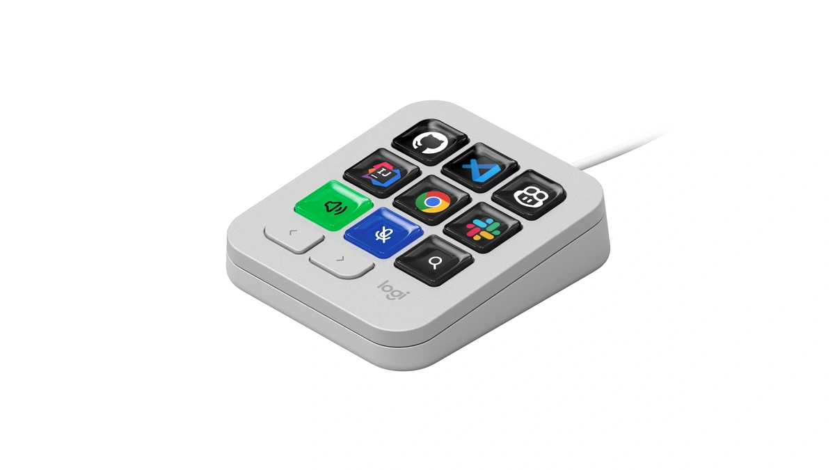 MX Keypad in pale gray, three-quarter view, its nine keys showing app and tool icons