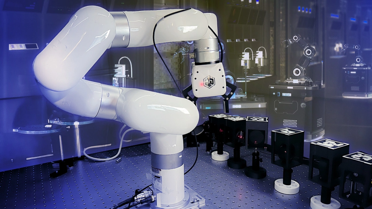 MIT robotic optics lab arm beside barcoded optics modules on a laser table in a blue-lit lab