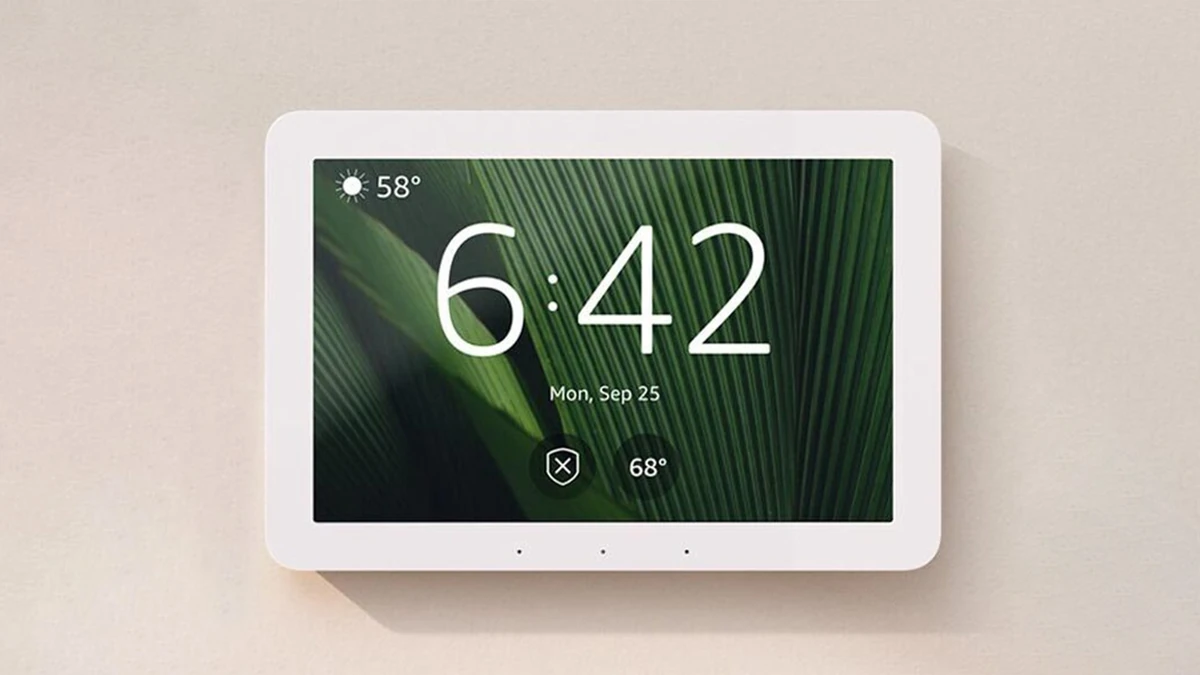 Amazon Echo Hub wall-mounted smart home display showing the time and date on its home screen