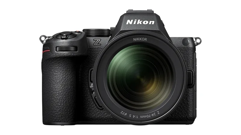Nikon Z5II mirrorless camera with a NIKKOR Z 24-70mm f/4 S lens seen from the front on a white background
