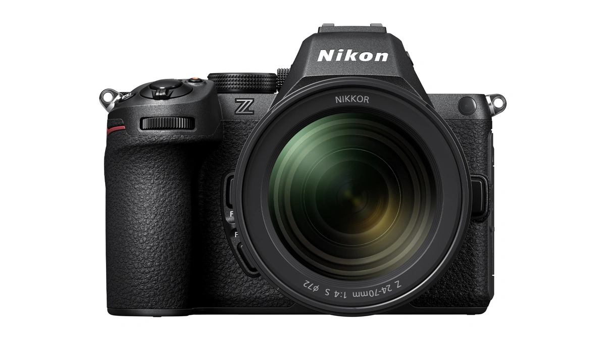 Nikon Z5II mirrorless camera with a NIKKOR Z 24-70mm f/4 S lens seen from the front on a white background