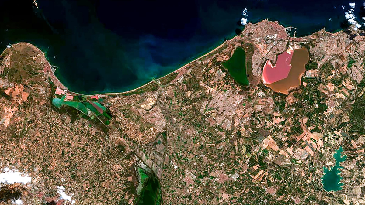 Planet Tanager-2 first light satellite image of a coastline with a pink lagoon and farmland
