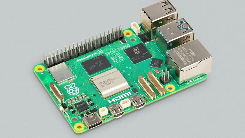 Raspberry Pi 5 single-board computer photographed from above on a grey background