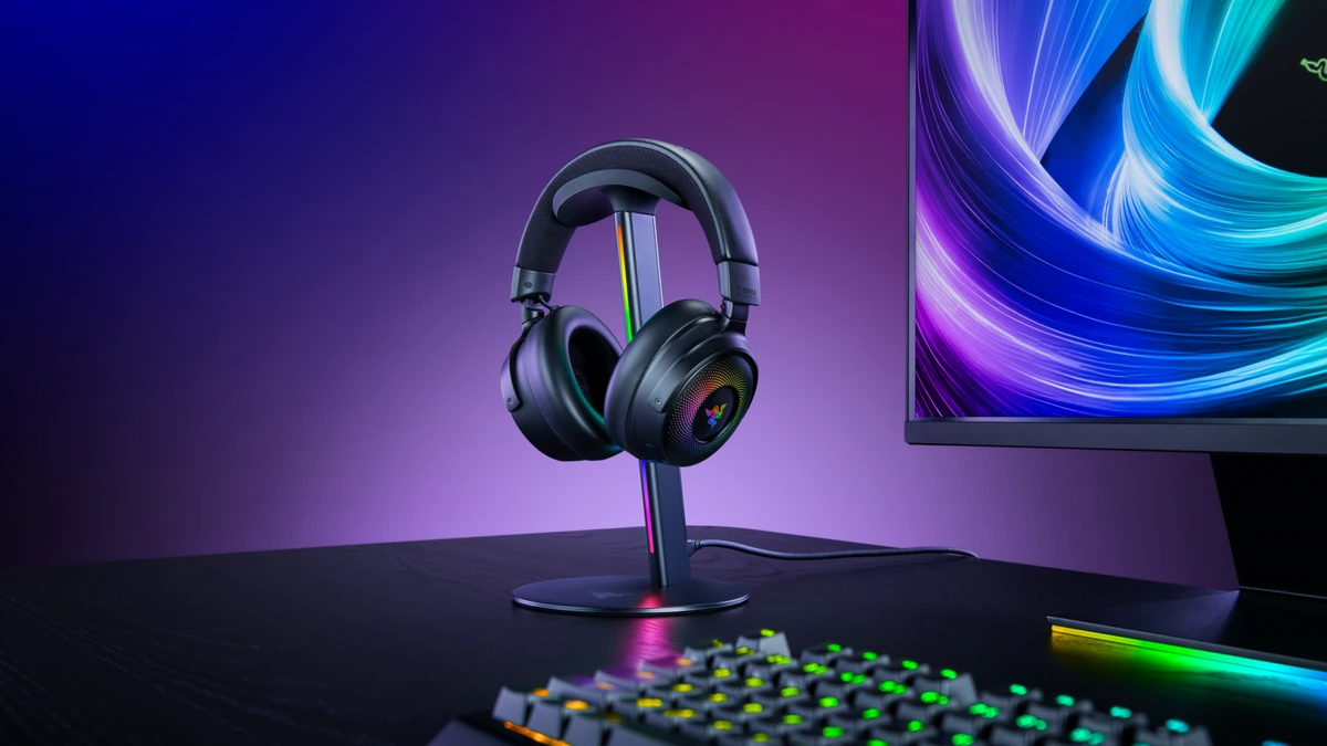 Razer Base Station V3 Chroma headset stand with a headset docked, RGB strip lit