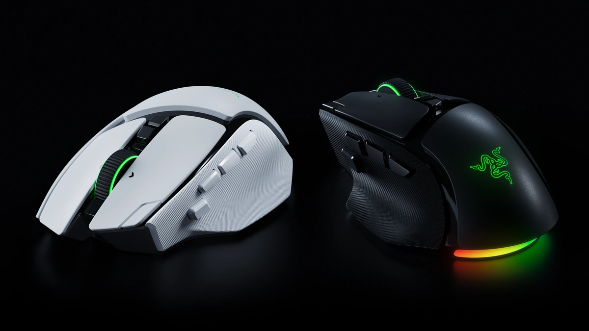 Razer Basilisk V4 Pro gaming mice in white and black with green-lit logos and RGB underglow on a dark background