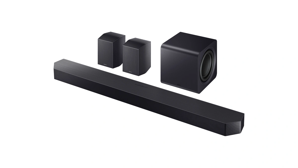 Samsung HW-Q990F soundbar with its subwoofer and two rear speakers on a white background