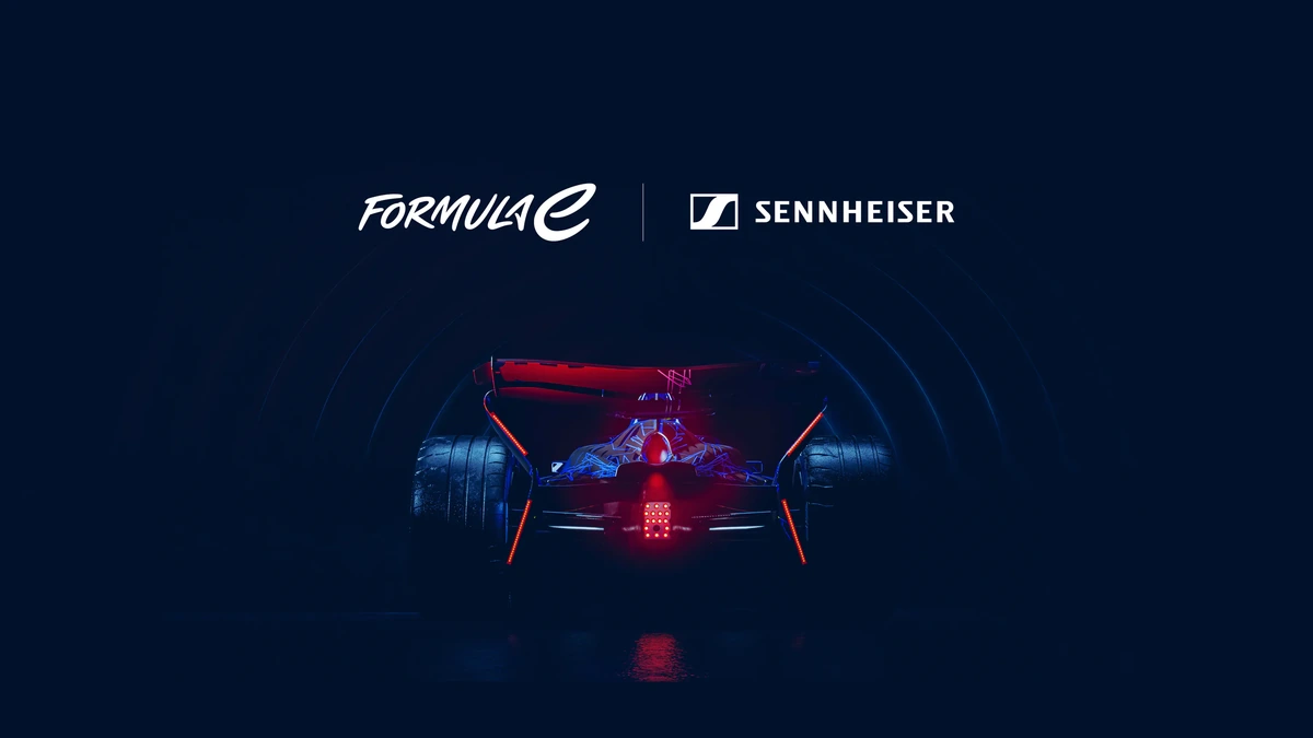 Formula E and Sennheiser partnership key art with a race car silhouette in a dark tunnel