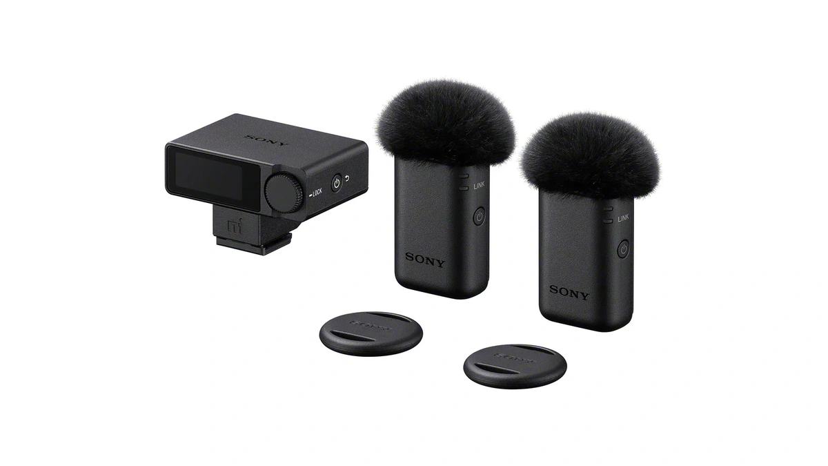 Sony ECM-W5 wireless microphone kit with two transmitters and windscreens beside a receiver