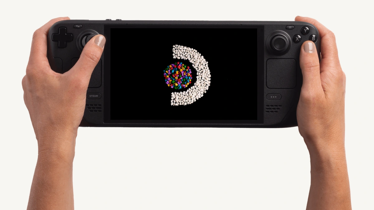 Hands holding the Steam Deck OLED handheld