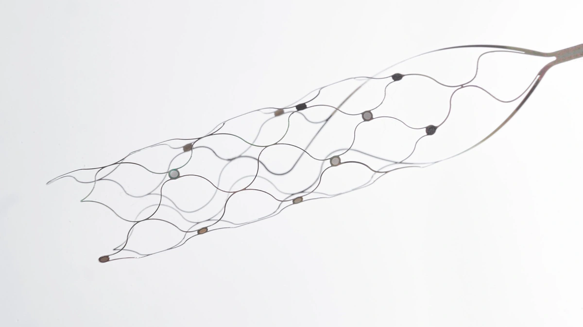 Synchron Stentrode, a mesh stent with small electrodes, on a white background