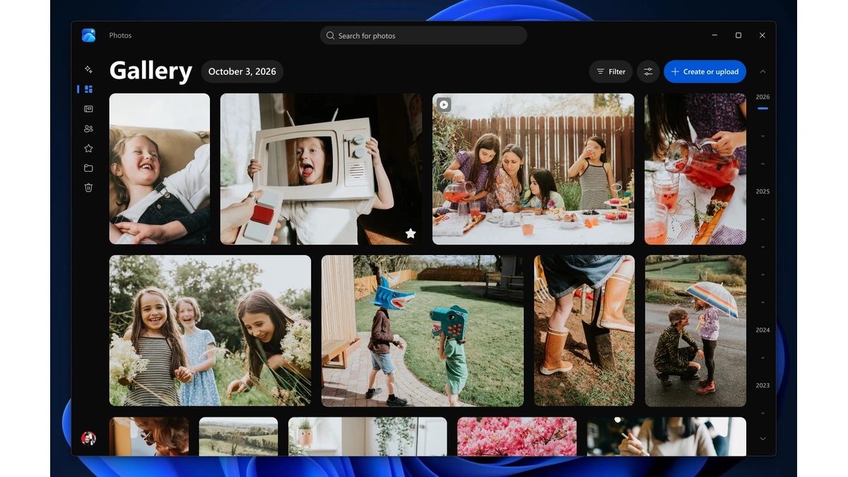 Microsoft Photos app on Windows 11 showing the new Gallery view with a grid of family photos on a dark theme