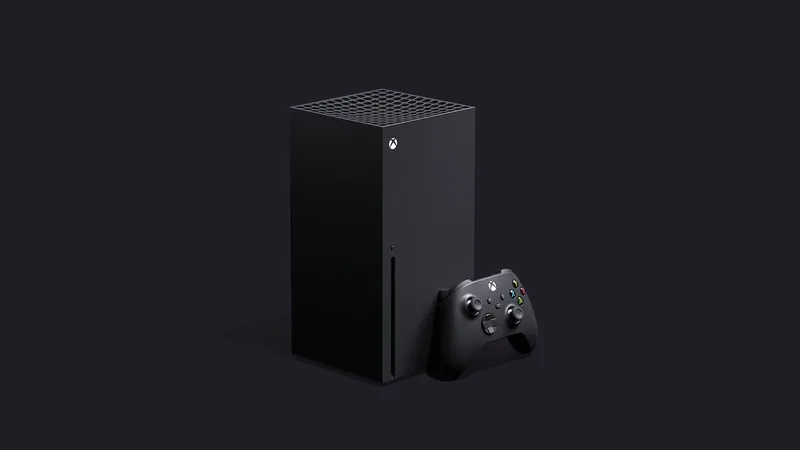 Xbox Series X console standing upright beside a wireless controller on a black background