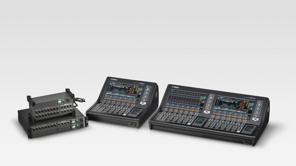 Yamaha DM5 and DM5 Compact digital mixing consoles with two R series rack I/O units